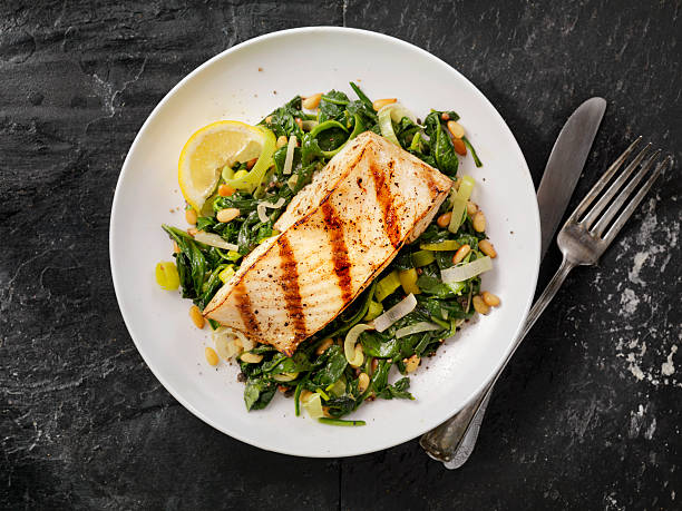Grilled Halibut with Spinach, leeks and Pine Nuts - Photographed on Hasselblad H3D2-39mb Camera