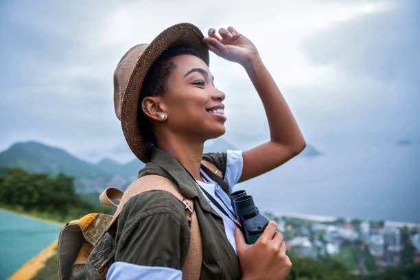 Portrait of young afro woman explorer